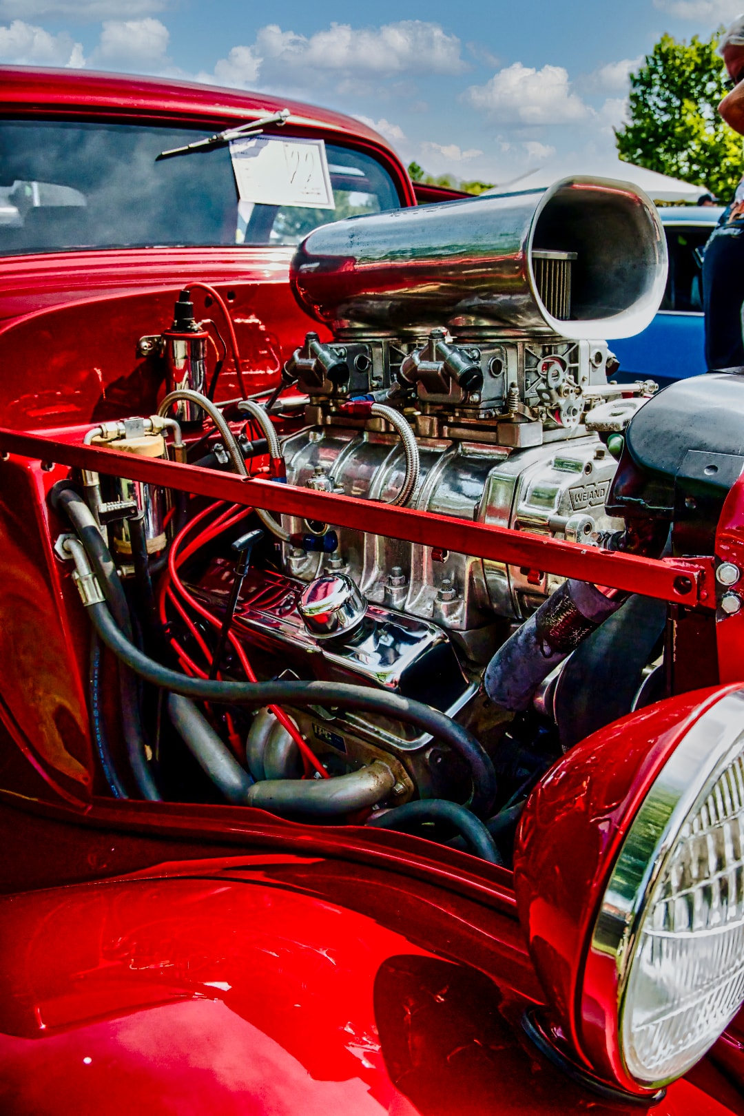 Red T-bucket blower engine detail — chrome supercharger and headers at the St. Clair County 4-H Fair
