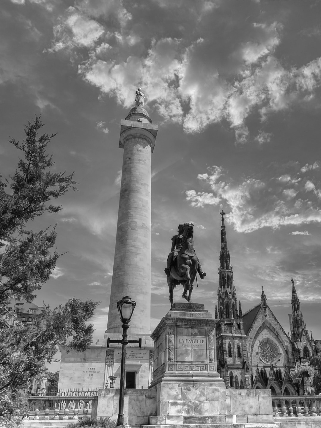 Washington Monument with Lafayette statue and church spire — black and white fine art photography by Atelier Lens LLC