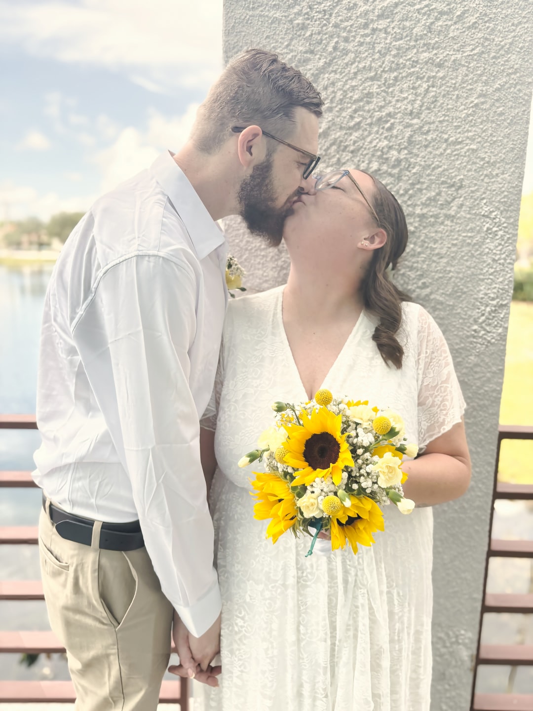 Wedding ceremony under floral arch — fine art elopement photography, Southeast Michigan