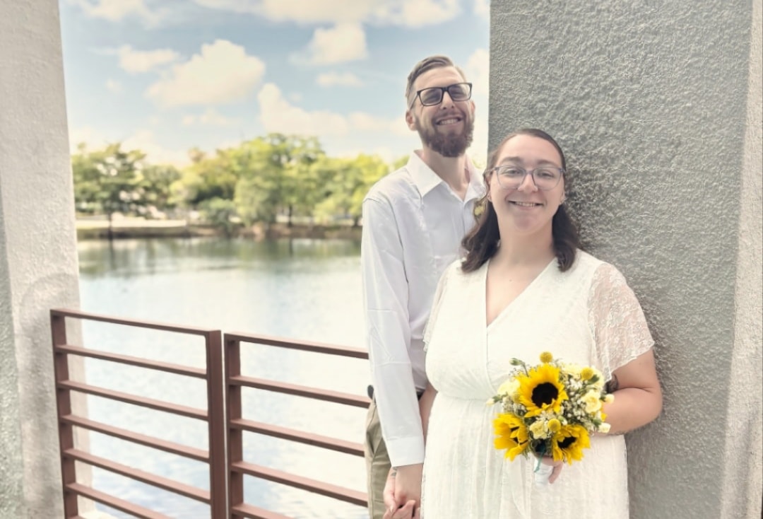 Couple sharing a kiss outdoors — intimate elopement photography, Southeast Michigan